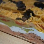 This 7 layer bean dip recipe is a crowd pleaser!
