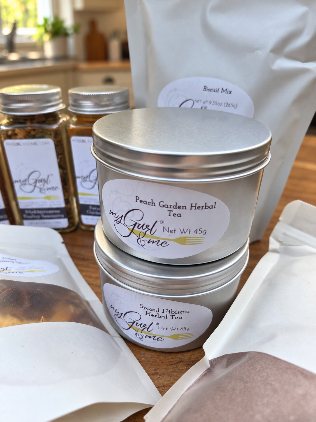 Herbal tea tins in a warm kitchen